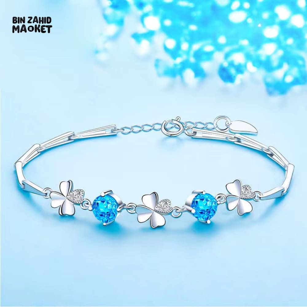 STERLING SILVER ZIRCONIA GOOD LUCK CHARMS BRACELET